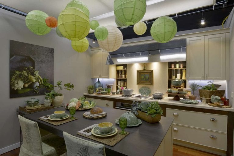 Transitional kitchen designed by Lifestyles and Interiors by Lisa and decorated with festive lime and white paper lanterns.