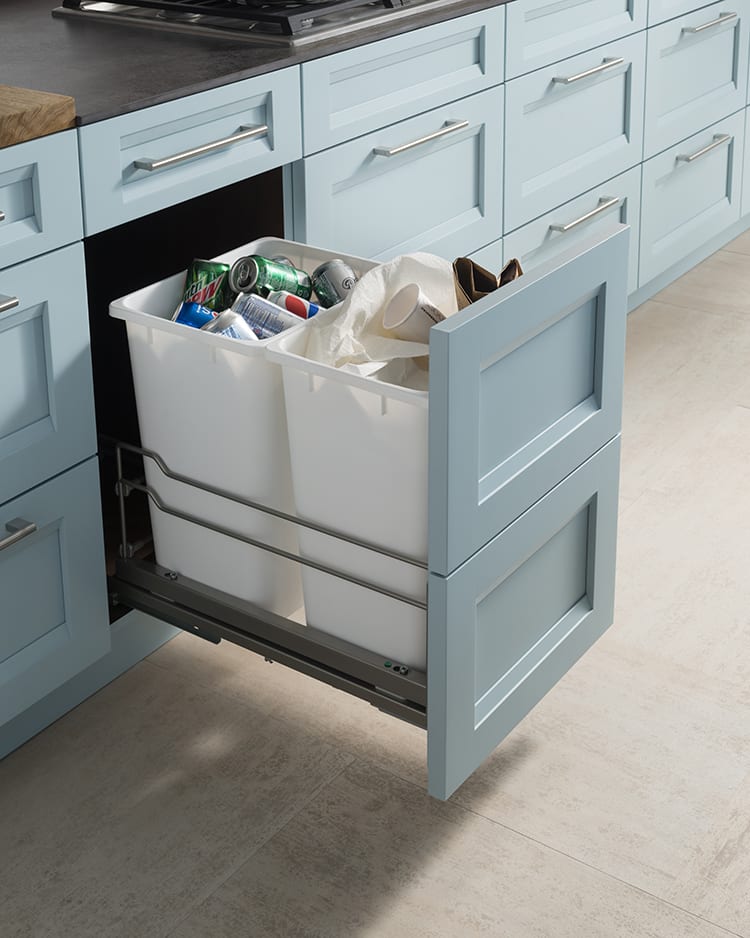Pull-out trash and recycling bin in kitchen
