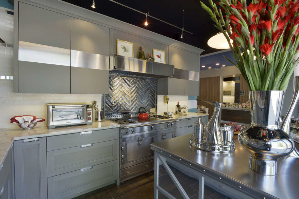 Anne Joyce's Art of the Table Kitchen with stainless and red accents