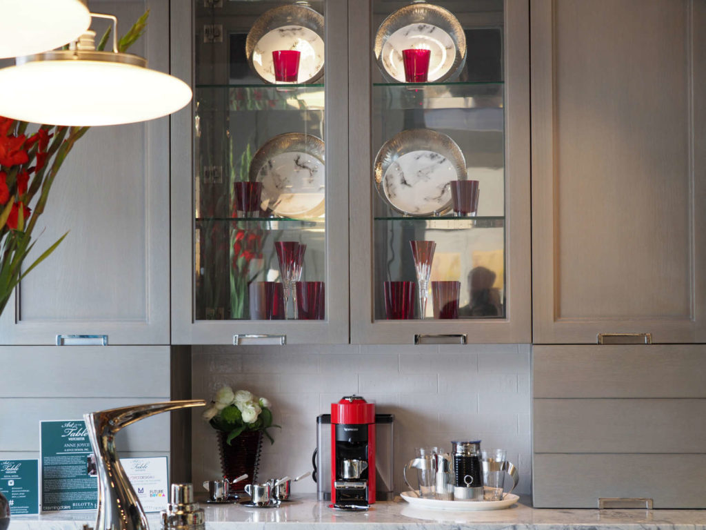 Anne Joyce's Art of the Table Kitchen with red glassware accents