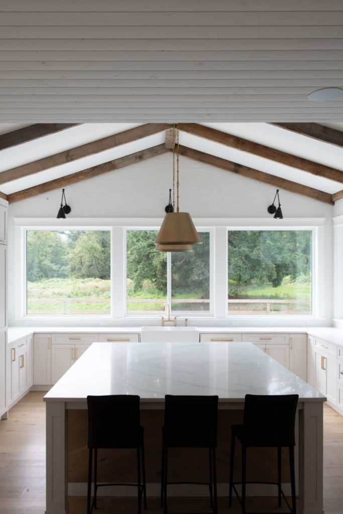 Kitchen with shiplap ceiling and exposed beams