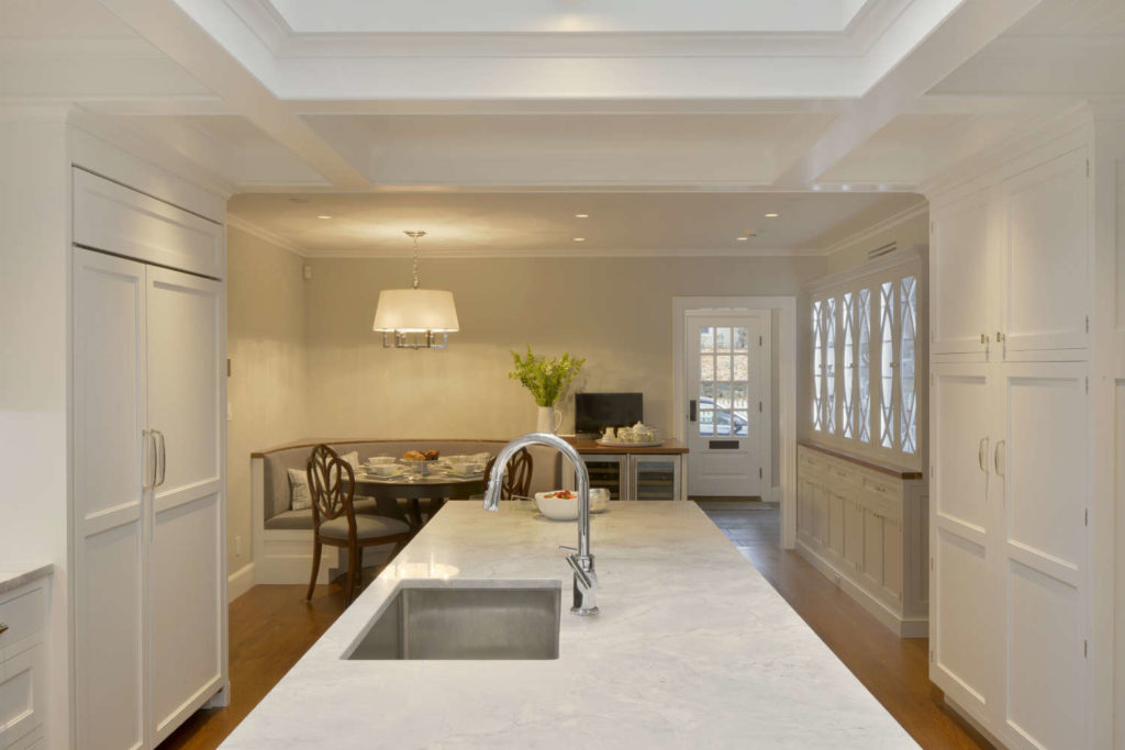 Traditional White Kitchen with beadboard-covered coffered ceiling