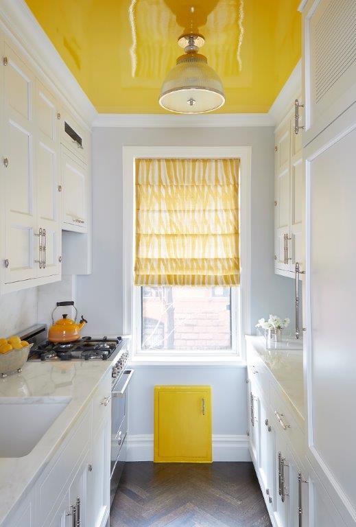 White Kitchen with yellow high-gloss ceiling