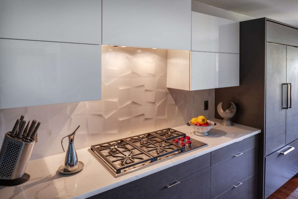 Contemporary White & Grey Kitchen with textural backsplash