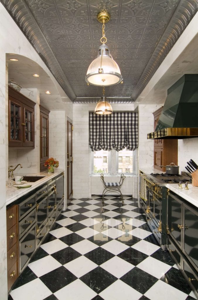 Green Metal Kitchen with Black & White Checkered Floor and Stamped Tin Ceiling