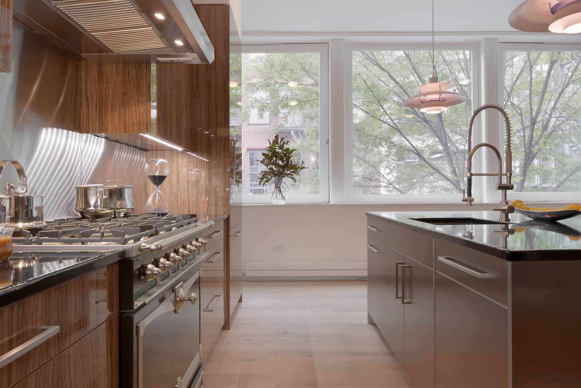 European-inspired NYC contemporary kitchen features an Alumasteel island and high gloss olivewood Artcraft cabinetry.