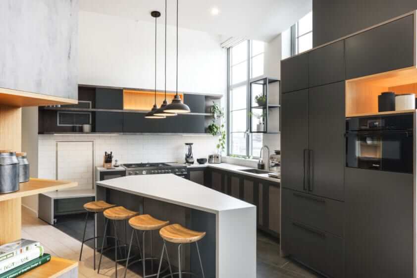 Industrial metal and wood NYC loft kitchen.