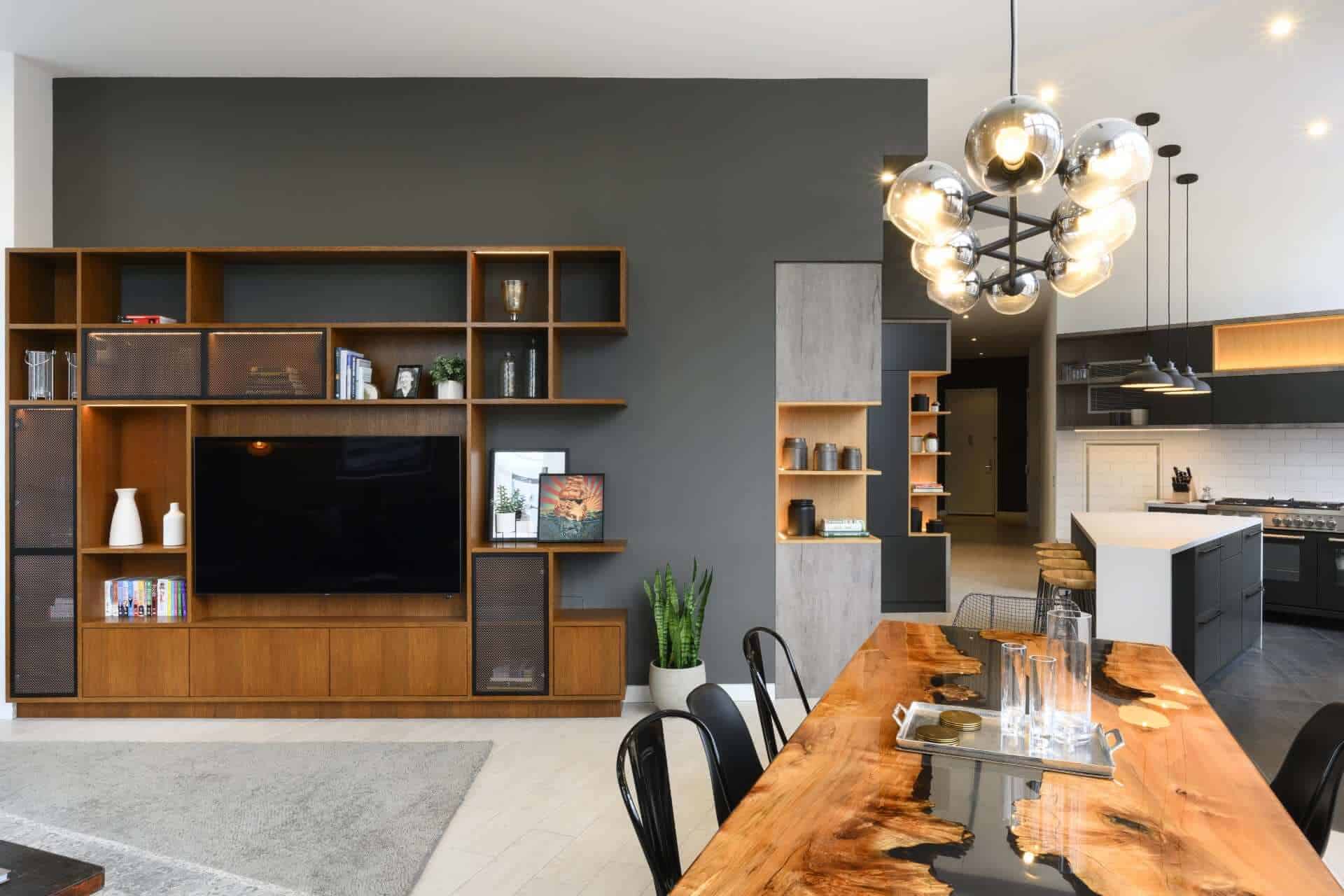 Industrial metal and wood NYC loft kitchen with entertainment center.