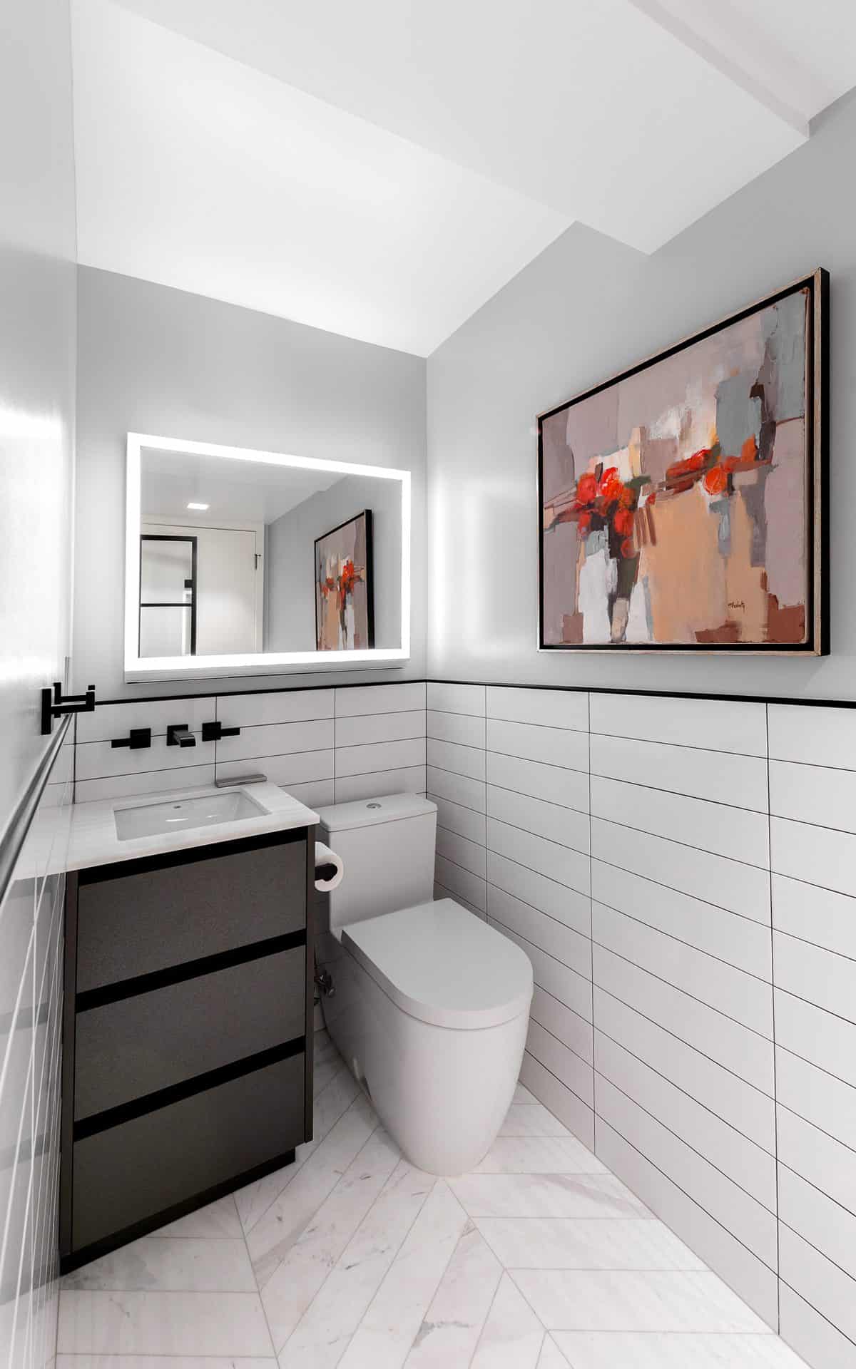 Modern bathroom features modern white appliances, black cabinetry, white chevron floor tiles and modern lighting.